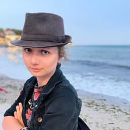 A profile image of Angela T.