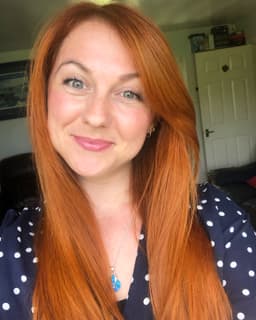 A profile image of Amber Knapp-Wilson